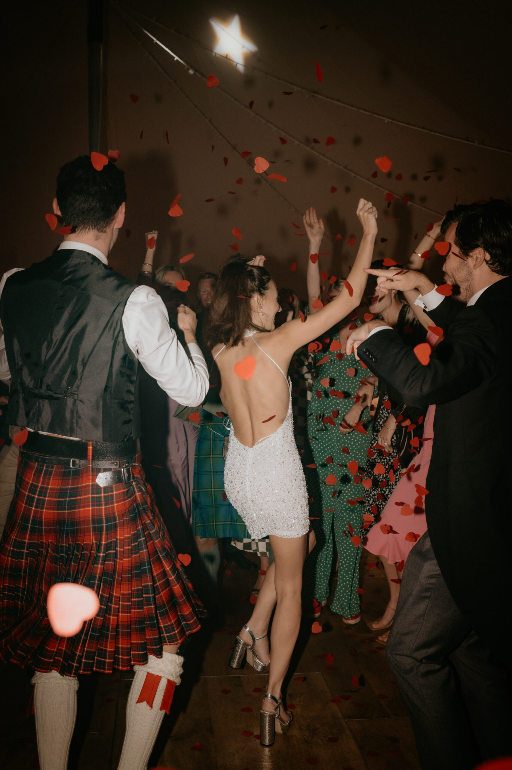 A bride dances onto the dance floor